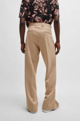 Pantalones de corte moderno en punto elástico técnico